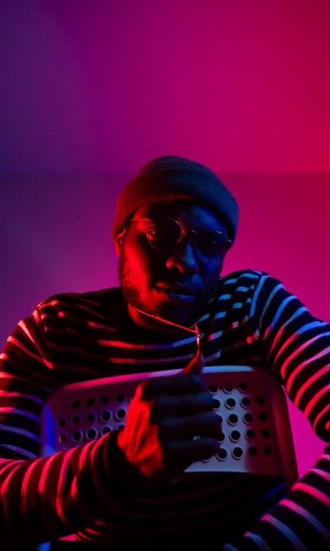 man inside pink lighted room