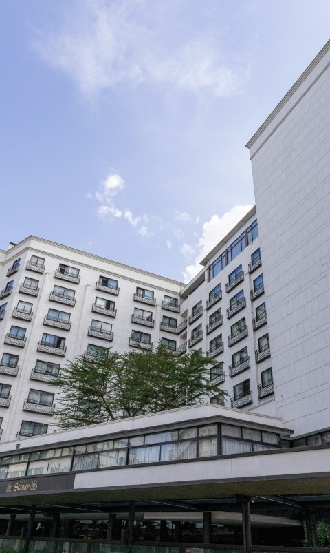 a building with a tree in front