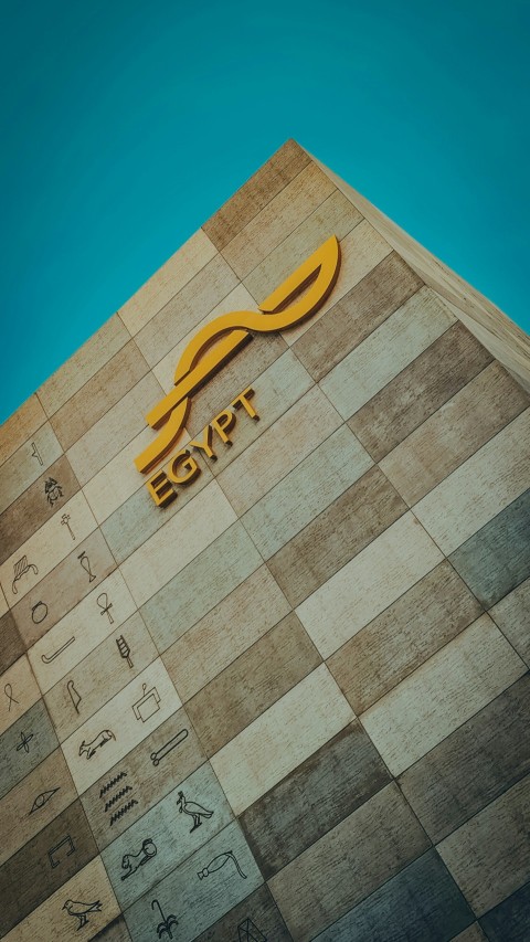 the egyptian symbols are on the wall of the building