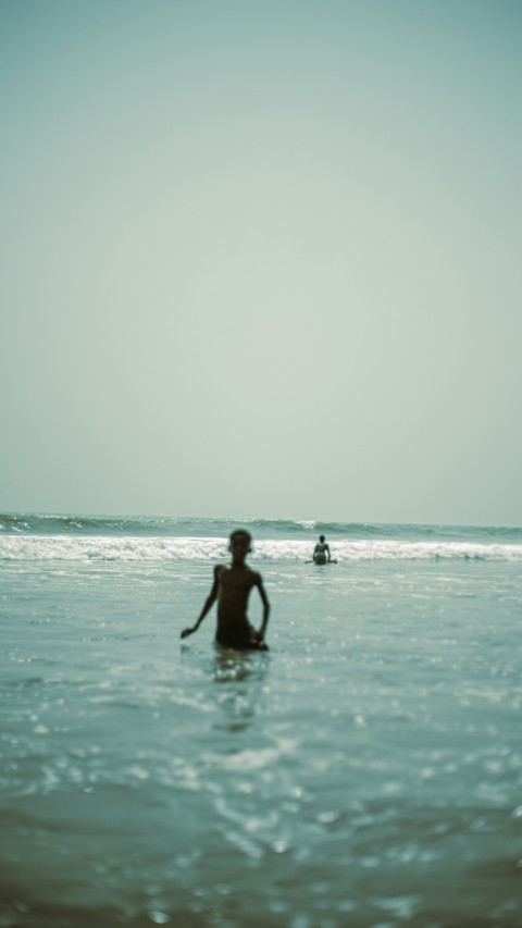 a person riding a surf board in the ocean