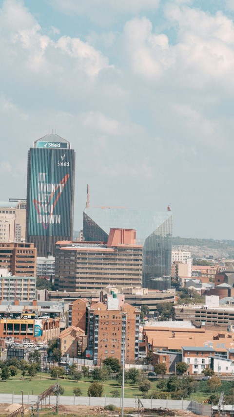 a view of a city with tall buildings