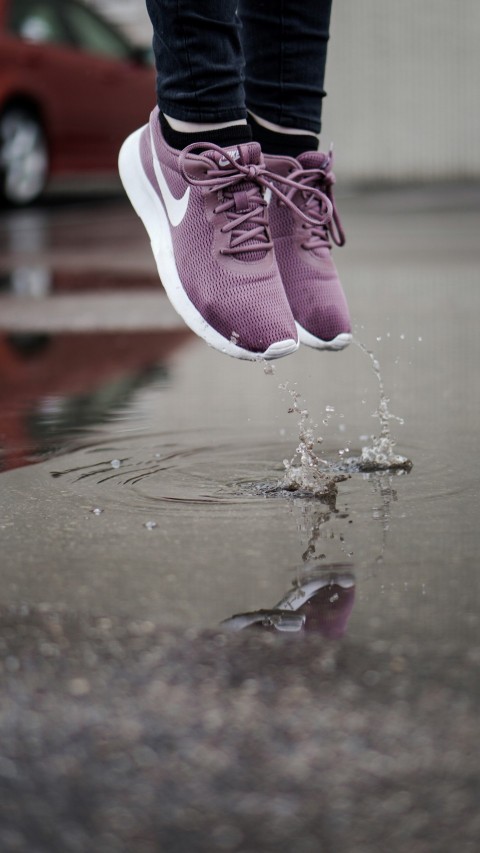 purple and white nike low top sneakers