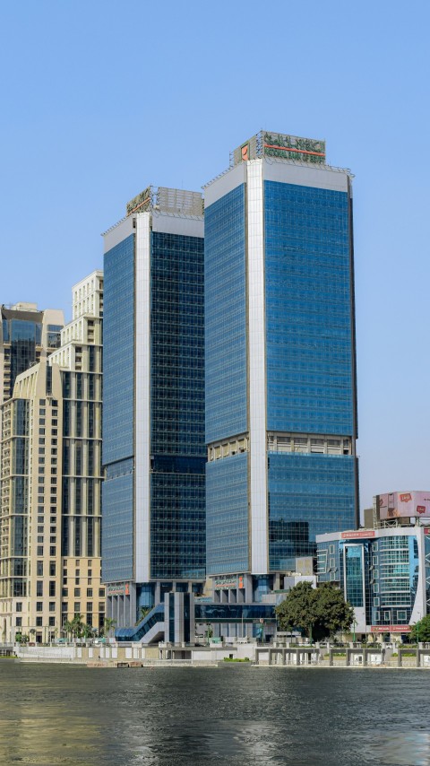 white and blue concrete building during daytime