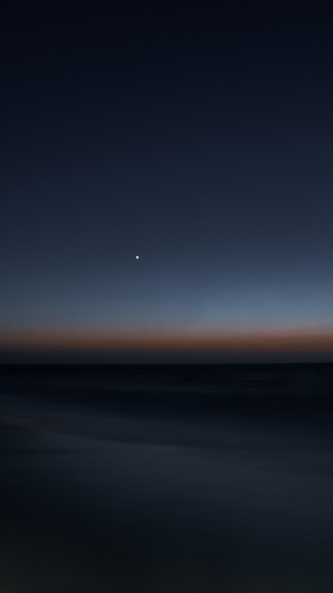 sun setting over the horizon