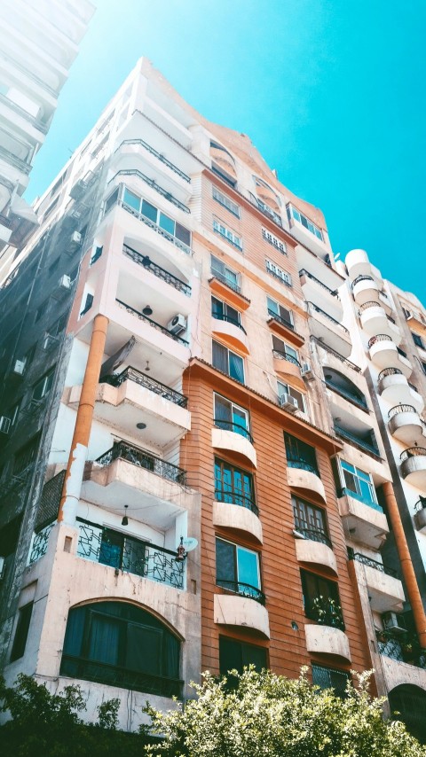 brown and white concrete building during daytime