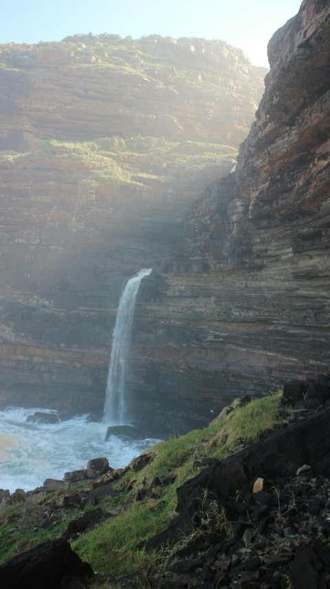 waterfalls during daytime