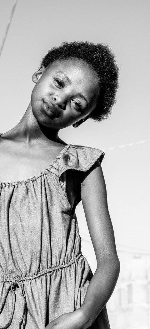 woman in tank top in grayscale photography