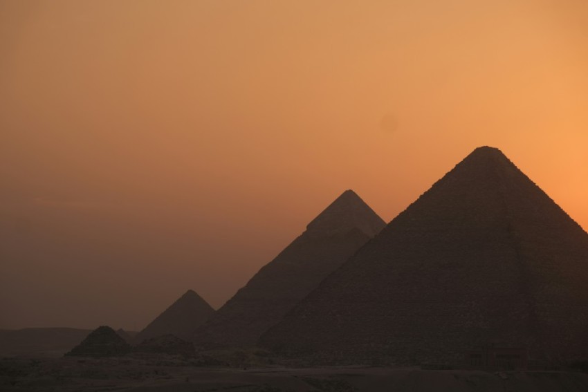 a large sphinx statue in the middle of a desert