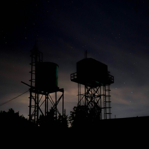 silhouette of large contaiers