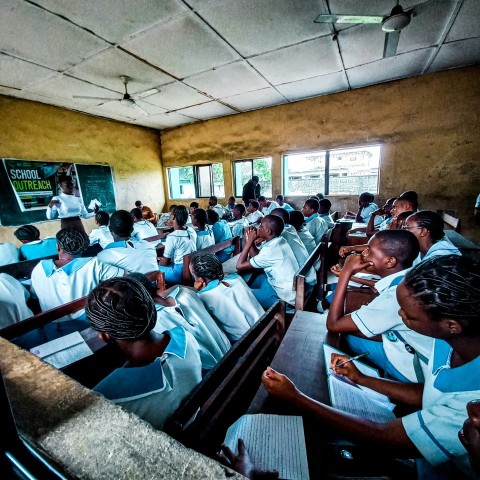 a group of people in a meeting