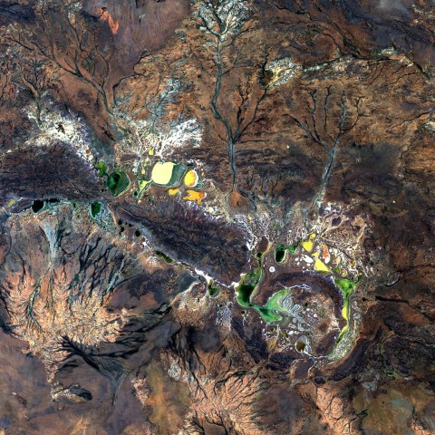 a satellite image of a mountain range with a lot of trees