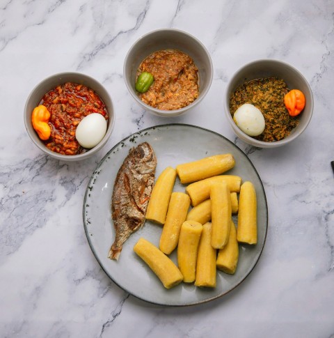 three bowls of food on a marble table