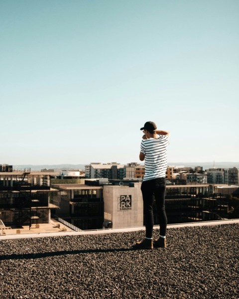 person taking photo near buildings