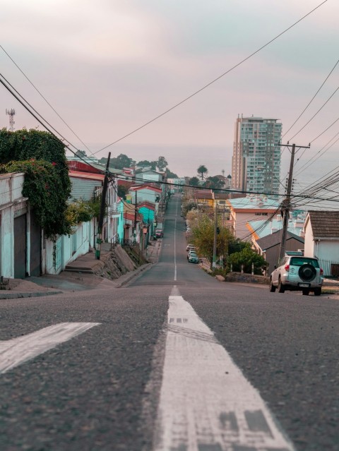 a street with a white line painted on the side of it