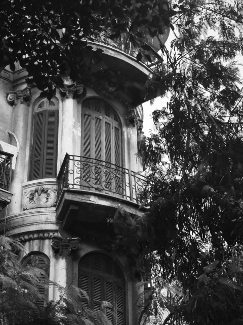 an old building with a balcony and balconies X21F wd