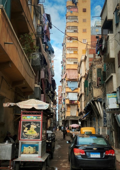 a city street filled with lots of tall buildings