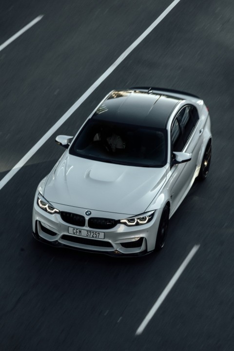 white bmw m 3 on road 1e