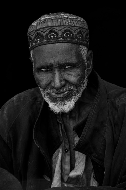 a man with a beard and a hat