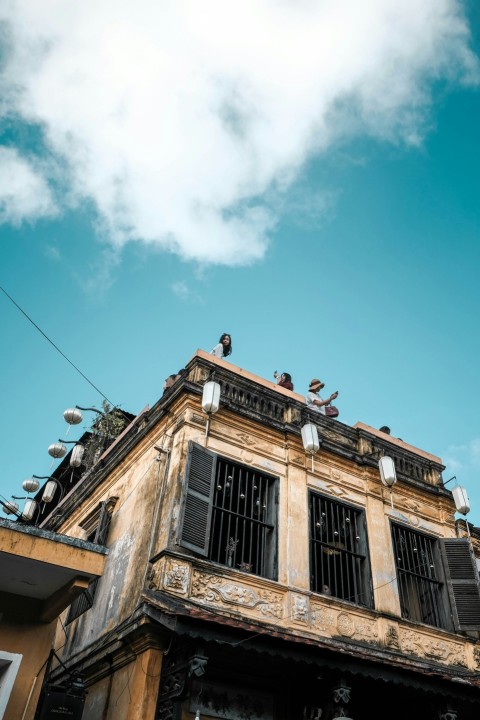 people at the roof of a building during day l