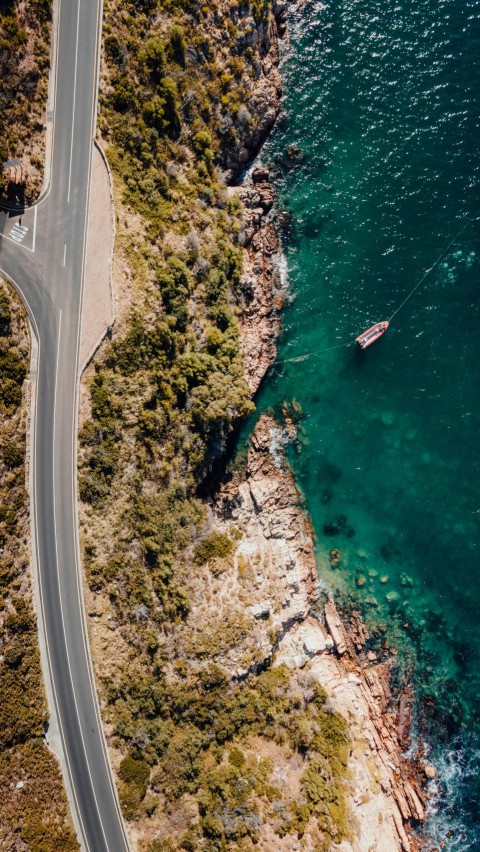 aerial view of a boat on a body of water