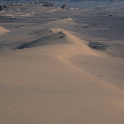 a view of the desert from an airplane